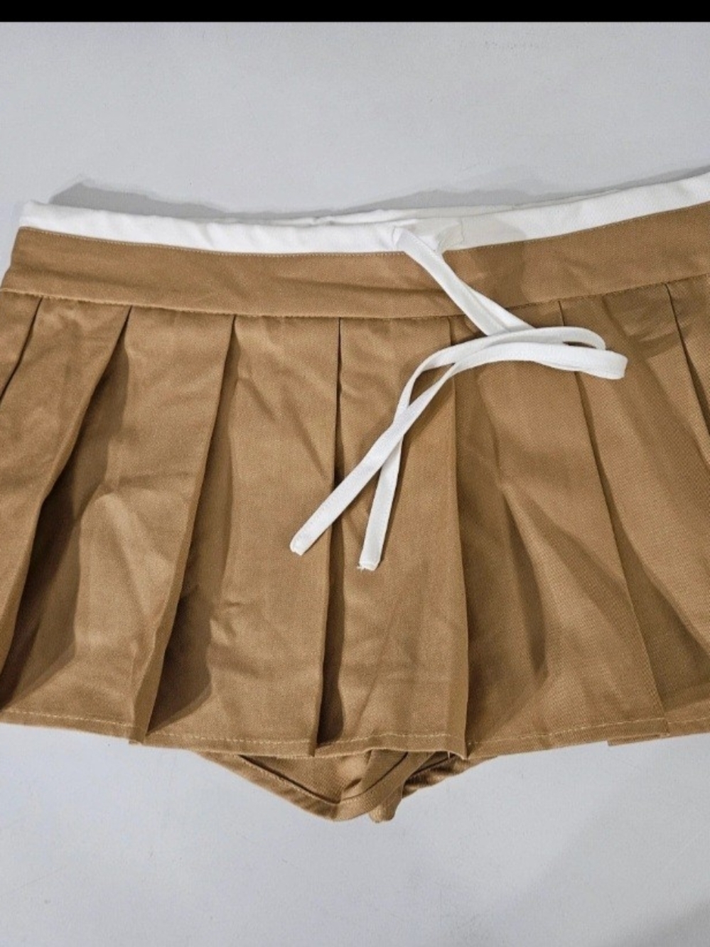 Lioness Tan Pleated Skort with White Waist Tie
